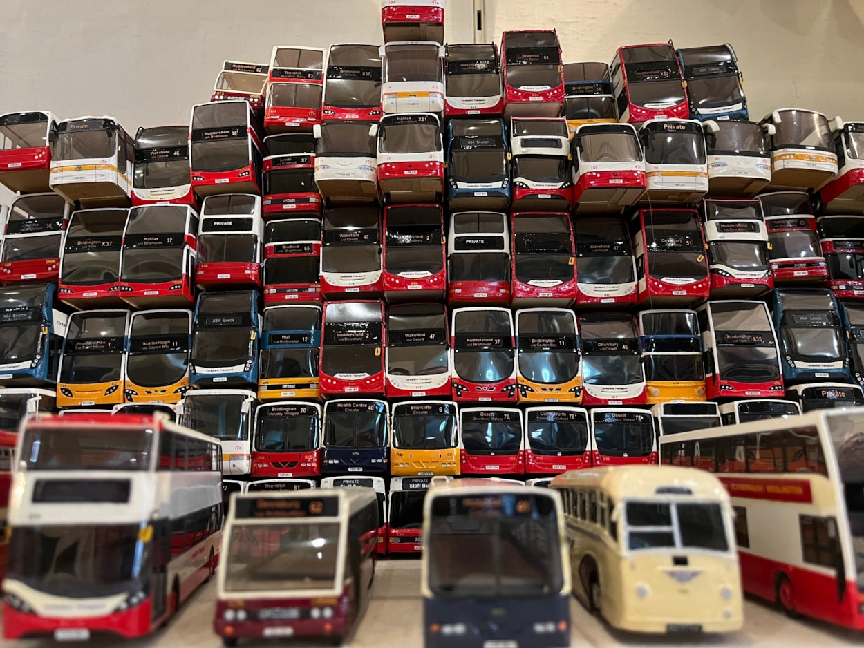 Bus collection: The meticulously detailed models each relate to a specific real-life equivalent, complete with service number and with every painstaking detail reproduced using card, packaging and acetate for the windows.