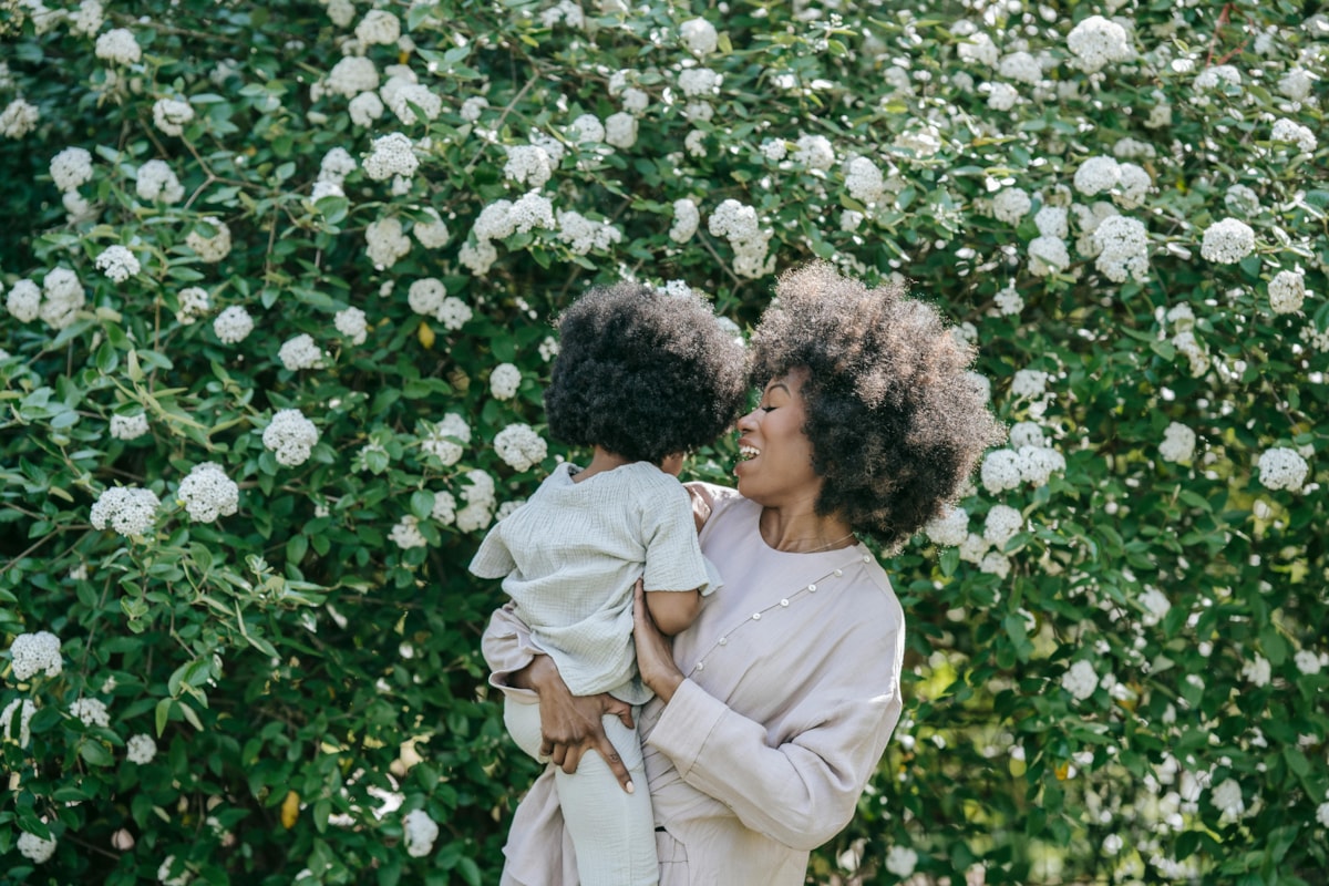 Mum and child with flowers