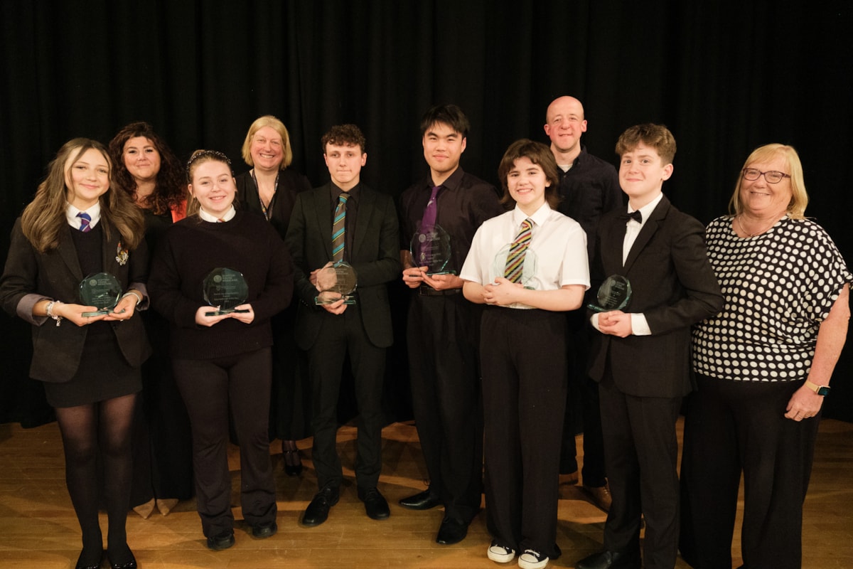 Junior and senior winners and runners up Evie Neave Gregor Ethan Mariella and Angus with Siobhan McAuley, Dr Julie Carrie, David Munn and Mae Murray