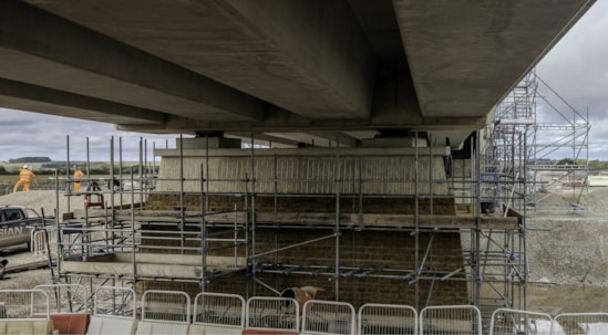Ironstone cladding being applied to one of the piers beneath the Oxford Canal viaduct Sept 2026
