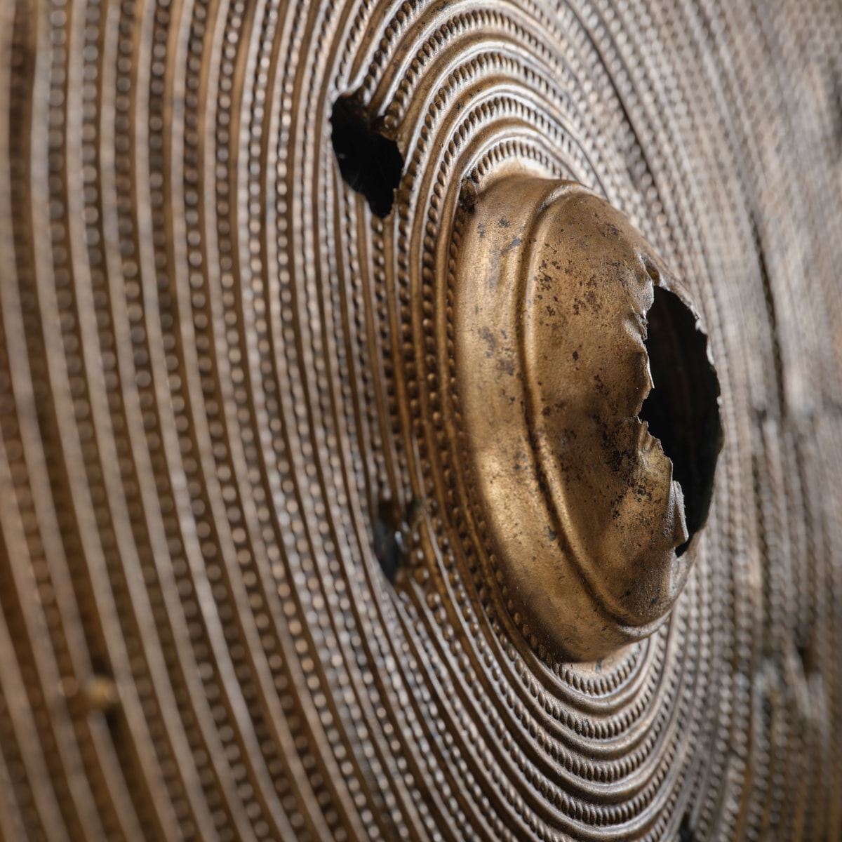 Bronze Age shield discovered in Beith. Image © National Museums Scotland 2