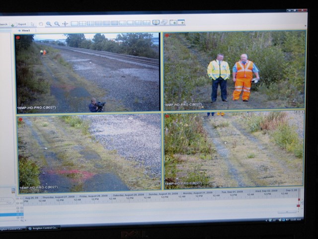 Screen showing high definition CCTV images_001: image on the top right is zoomed in from image on top left