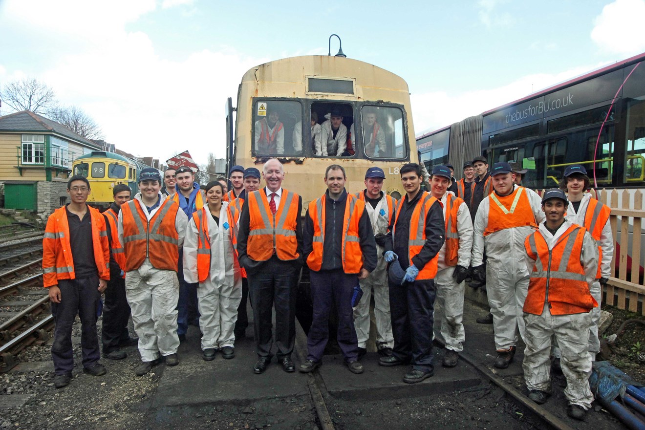 Apprentices join forces at Swanage Railway to contribute to main line link project: siemens-swt-apprentices-with-ex-br-late-1950s-class-101-dmu-swanage-ra-full-.jpg