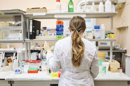 woman-in-white-long-sleeved-laboratory-gown-standing-3735715