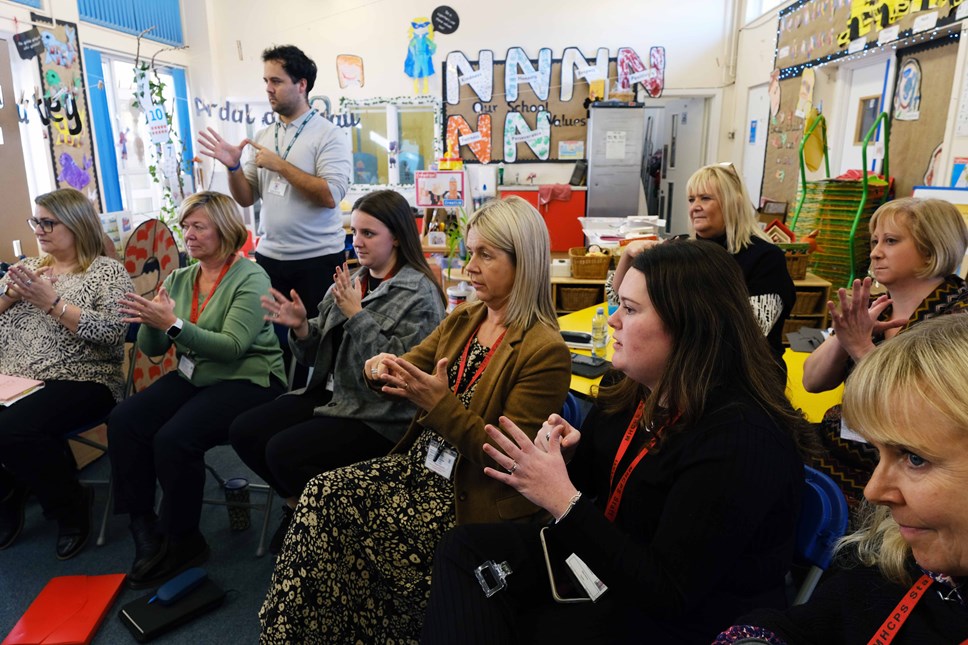 Teachers at Milford Haven Primary learning sign language