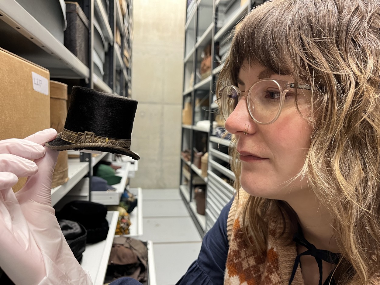 Leeds Discovery Centre hats: Leeds Museums and Galleries' audience development officer Sara Merritt holds a tiny top hat, one of a remarkable range of tiny replica hats, some of which fit in the palm of a hand. They were made by Leeds hatter John Craig in the early 1900s and is being carefully conserved as part of a project at the Leeds Discovery Centre.