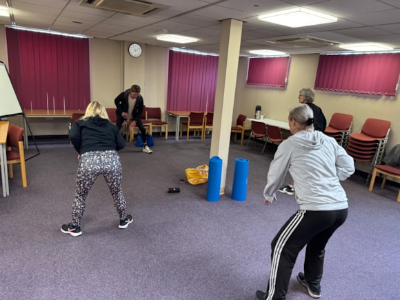 Burnley Library users taking part in Top To Toe weekly exercise sessions, aimed at all ages and abilities, to improve cardiovascular and muscular strength.