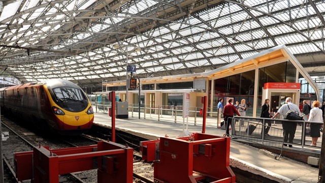 Standard lounge exterior with train: Standard lounge exterior with train