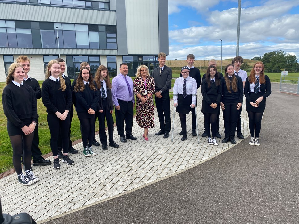 Moray Council's Head of Education, Vivienne Cross and Elgin High School Head Teacher, Hugh McCulloch, celebrate with S4, S5 and S6 pupils who received their SQ exam results on 8 August 2023.