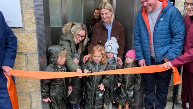 Four-year-old Aurora Cochrane from The Railway Children preschool has a go at ribbon-cutting duties