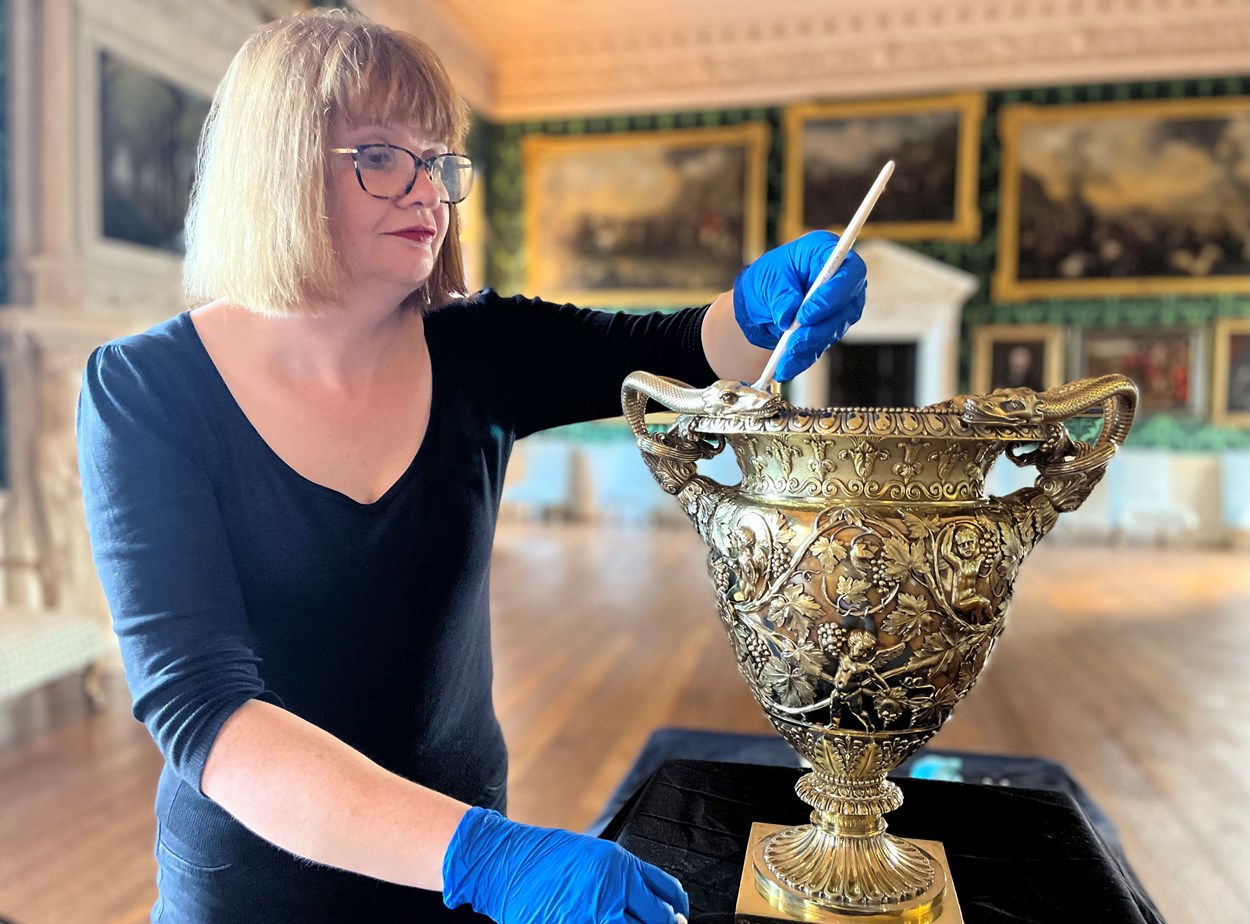 Temple Newsam treasures: Leeds Museums and Galleries conservator Emma Bowron with the silver gilt Doncaster Gold Cup 1828-29, part of an array of silverware that has been conserved for a revamped display at Temple Newsam House.