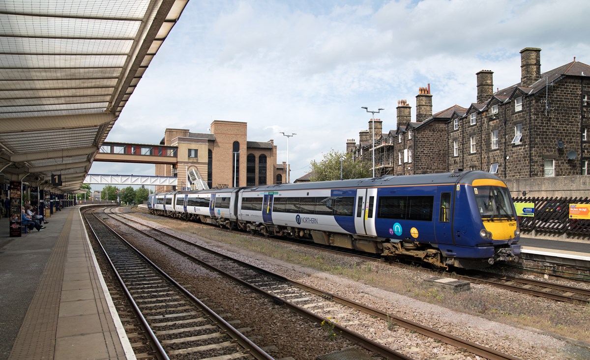 This image shows a train standing at Harrogate station