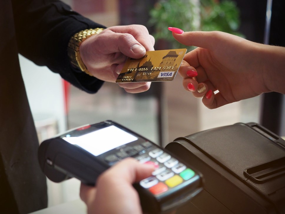 Person paying with bank card