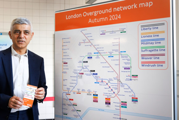 The Mayor of London, Sadiq Khan with the new London Overground map