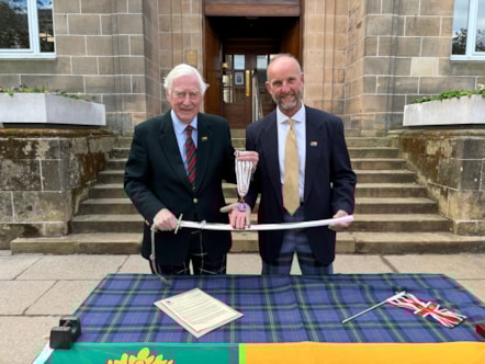 Former Lord-Lieutenant of Moray Major General Seymour Monro hands over the sword and badge to new Lord-Lieutenant of Moray Air Commodore Alistair Monkman CBE after five years in the role.