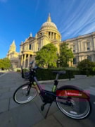 Amin Malikov’s image of an electric Santander Cycle in front of St. Paul’s Cathedral: Amin Malikov’s image of an electric Santander Cycle in front of St. Paul’s Cathedral