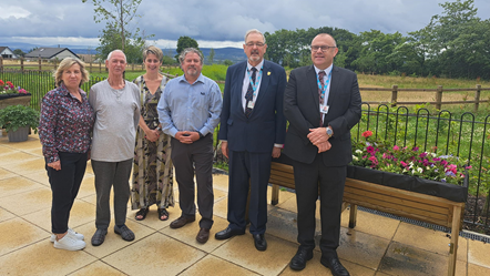 Pictured L-R at the new Meadowfold Hyndburn Ribble Valley Short Break Service in Great Harwood are team manager Jayne Driver, service user Alan Drew, area registered services manager Lancaster and Morecambe and East Lancashire Kellie-Anne Buczynski, registered manager Reine Swindlehurst,  Lancashire County Councillor and cabinet member for adult social care Graham Gooch and Lancashire County Council's director of adult care and provider services Paul Lee.