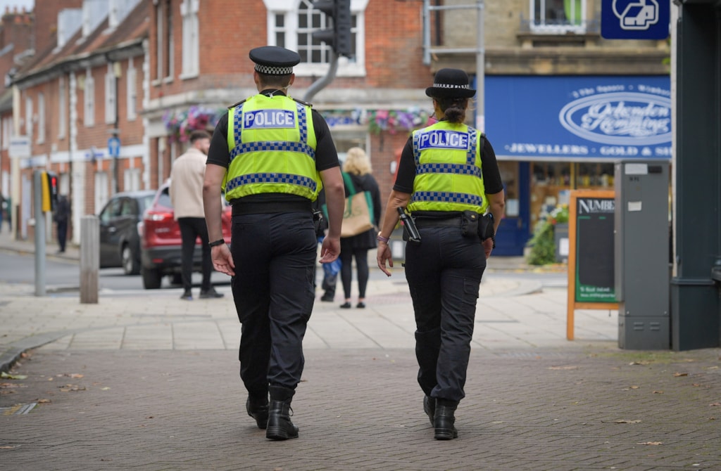 Uniformed officers on patrol 1