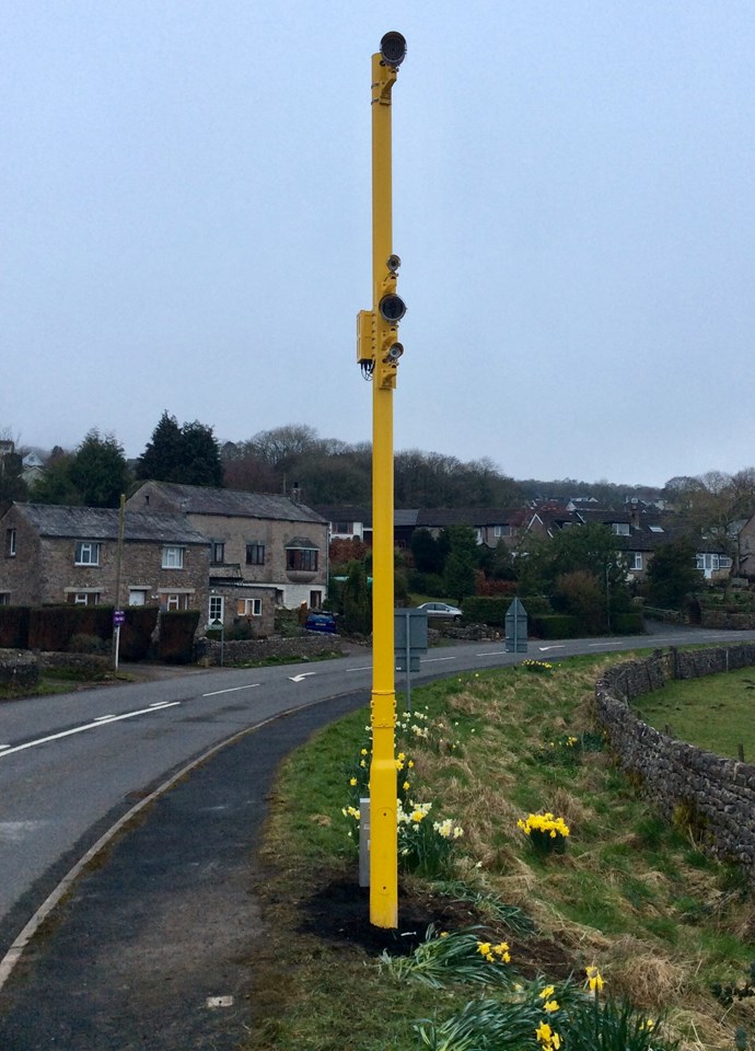The yellow painted RLSE camera at Black Dyke level crossing in Arnside