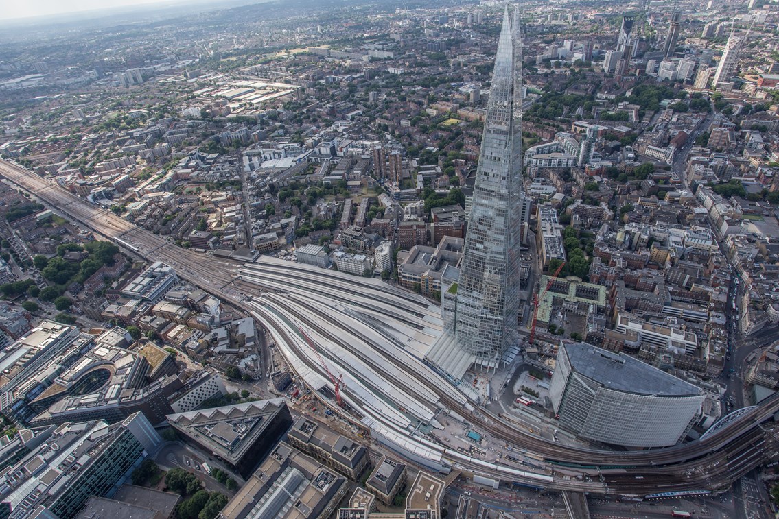 aerial - London Bridge (7): London Bridge station and the Shard. The final section of canopy is about to be craned into place on the new platform 1