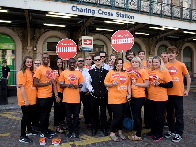 Leafleters at Charing Cross: The leafleting team with the band outside Charing Cross station