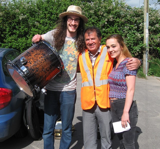 Morgan Pettigrew gets his rare stolen drumkit back from Network Rail engineer Derek Wahid 1-2