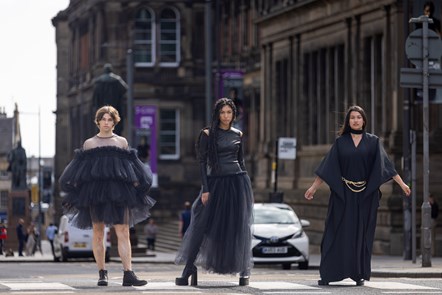 Models (L-R)  Joshua Cairns, Grace Dempsey and Shannon Summers arrive at the National Museum of Scotland ahead of the opening of Beyond the Little Black Dress on  Saturday (1 July). The exhibition deconstructs an iconic wardrobe staple, examining the radical power of the colour black in fashion. Image copyright Duncan McGlynn.
