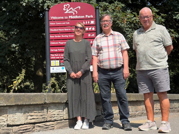 DPHAR 2026 - Colin 3: Colin's life transformed after he first joined a walking group at Middleton Park with charity Health for All. Pictured from left, Gayle Graham, community development worker at Health For All, Colin Clark and Allan Garden, a friend he met at the walking group who suggested he join a choir.