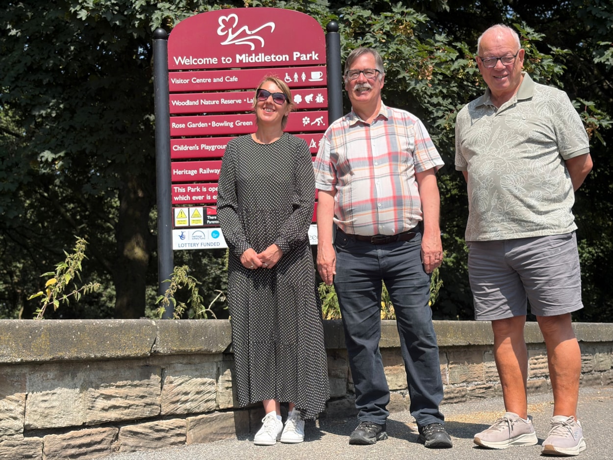 DPHAR 2026 - Colin 3: Colin's life transformed after he first joined a walking group at Middleton Park with charity Health for All. Pictured from left, Gayle Graham, community development worker at Health For All, Colin Clark and Allan Garden, a friend he met at the walking group who suggested he join a choir.