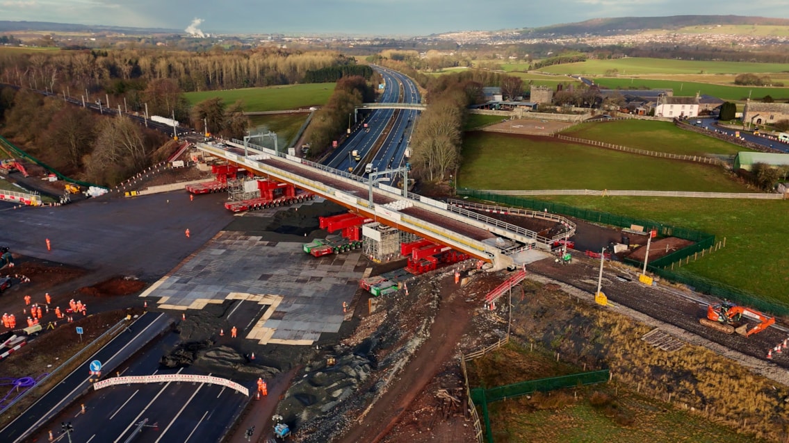 M6 opens half a day early after successful railway bridge installation: New Clifton railway bridge in final position relinking West Coast Main Line