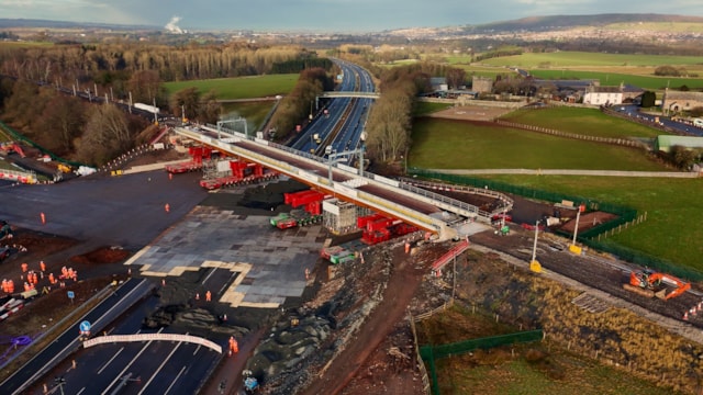 M6 opens half a day early after successful railway bridge installation: New Clifton railway bridge in final position relinking West Coast Main Line