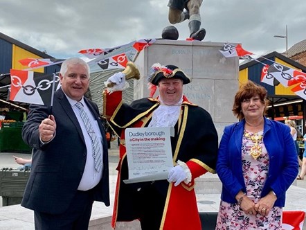Mayor and leader with town crier in Dudley town centre