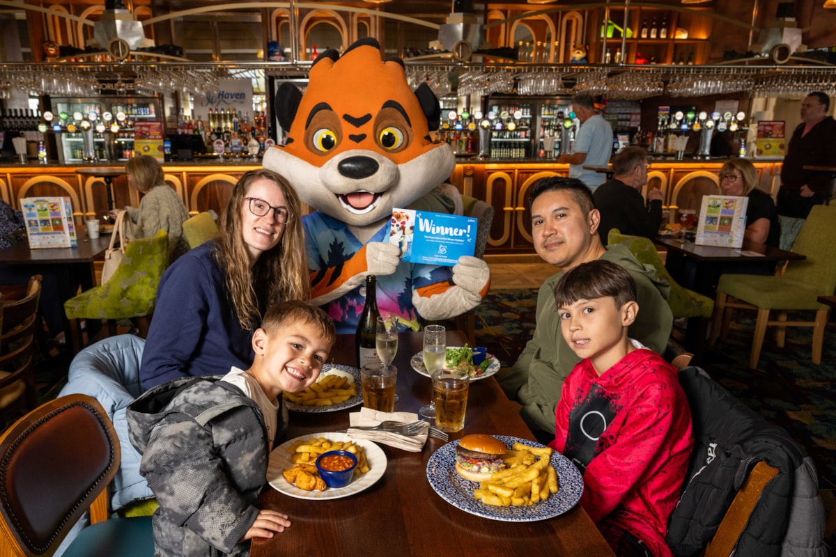The Deang family and Rory the Tiger - winner of Haven x JDW One Million Meals Sold