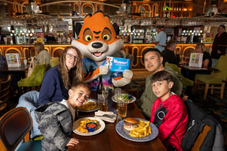The Deang family and Rory the Tiger - winner of Haven x JDW One Million Meals Sold