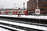 TfL Image - Clearing the platform at East Finchley: TfL Image - Clearing the platform at East Finchley