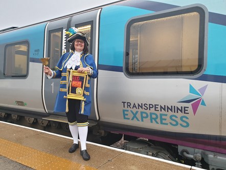 Sharon Wilson, Saltburn Town Crier celebrating the new TransPennine Express rail link