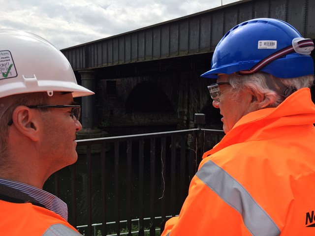 Roger Stephenson: Network Arch Bridge architect Peter Jenkins, on the left, speaks to Roger Stephenson in front of Stephenson's Bridge.