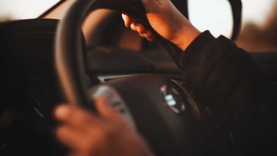 Hands on steering wheel