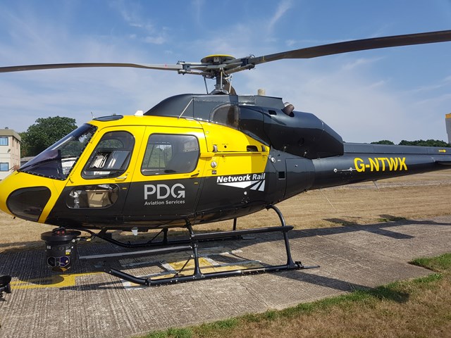 Network Rail’s heat-seeking helicopter took to the skies of Surrey this week to help protect South Western Railway passengers from train delays: Helicopter at Fairoaks- 07-08-18