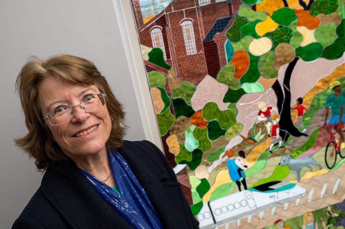 Local artist Vicki Aizlewood with one of the stained glass window