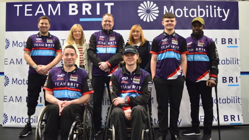 Team BRIT x Motability Scheme partnership launch - team photo: From left to right: Paul Fullick, Team BRIT driver; Dom Shore, Team BRIT driver; Lisa Thomas, Chief Marketing Officer, Motability Operations; Mike Scudamore, Commercial Director, Team BRIT; Noah Cosby, Team BRIT driver; Lisa Witherington, Managing Director Customer Services, Motability Operations; Caleb McDuff, Team BRIT driver; Tyrone Mathurin, Team BRIT driver.