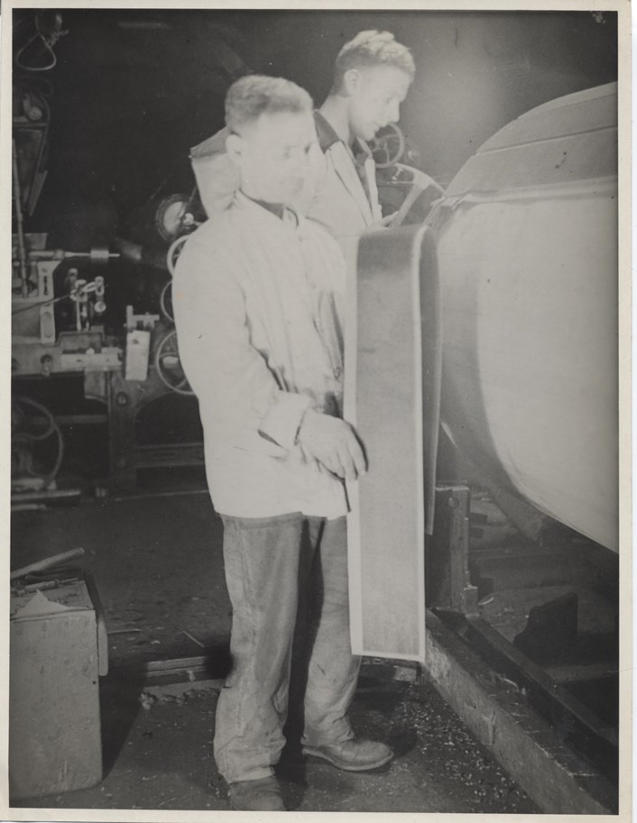 Song of the Female Textile Workers: Workers at Armley Mills working on a carding engine.