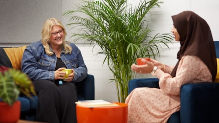 Female colleagues talking-2 cropped