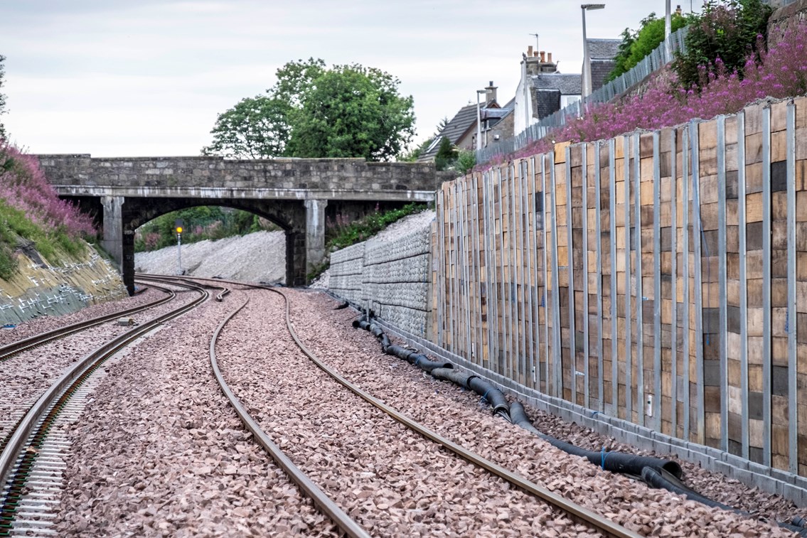 Aberdeen-Inverness line reopens on-time for customers: Pic 1. New track and retaining wall near Crossgates