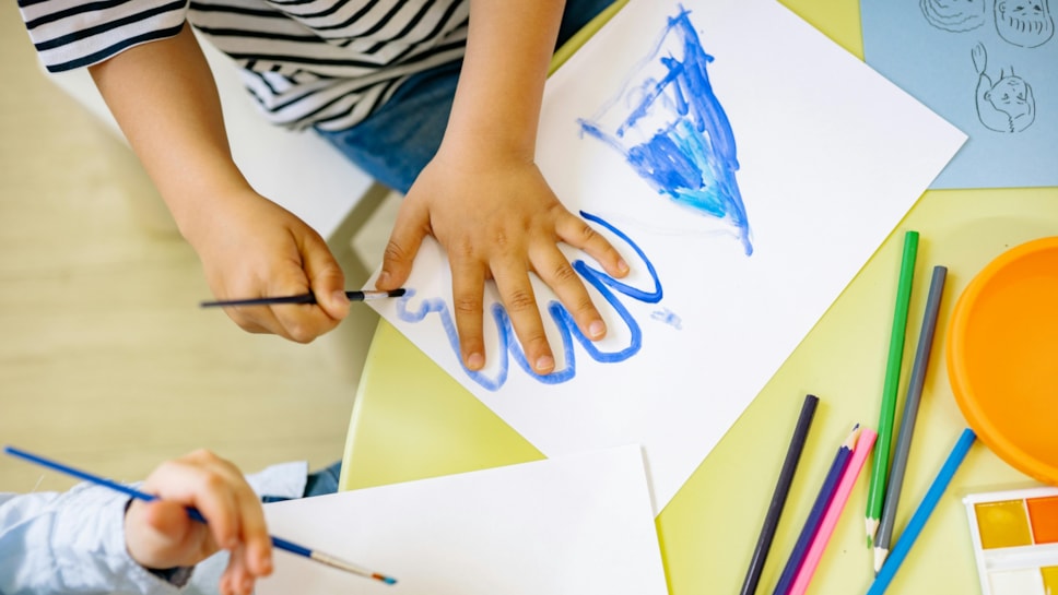 Child hand with drawing