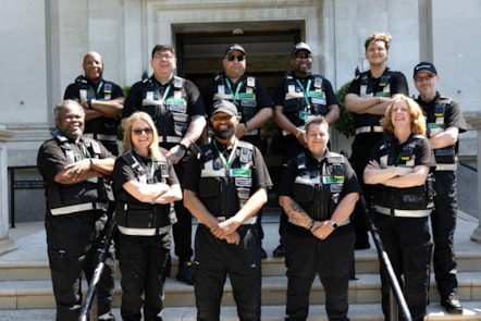 Islington's new neighbourhood patrol team stand in uniform on the steps on the town hall