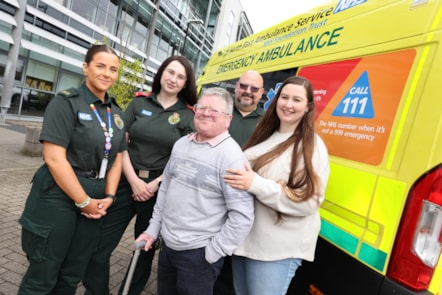 Duncan Stuart reunion in front of ambulance at Bernicia houise