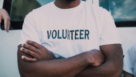 Man wearing volunteer top