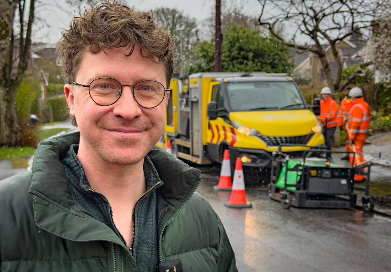 Thermal Testing: Leeds City Council’s deputy leader and executive member for economy, transport and sustainable development, Councillor Jonathan Pryor, with the Thermal Road Repairs machine filling potholes in a Leeds residential area.