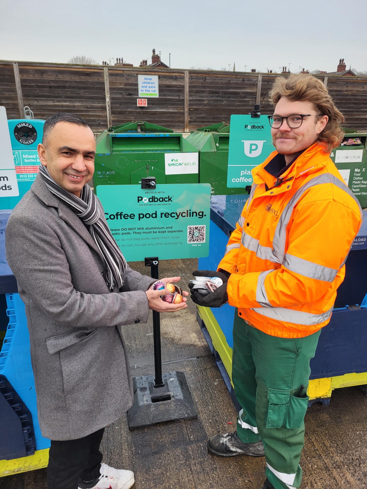 Podback banks at Kirkstall - Cllr Rafique (left) with recycling site assistant Reece Armstrong (right): Cllr Mohammed Rafique (left) with recycling site assistant Reece Armstrong (right) ready to recycle coffee pods at the new facilities at Kirkstall Household Waste Recycling Centre